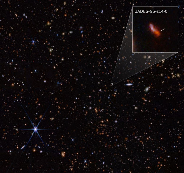 This handout image obtained on May 30, 2024 courtesy of NASA/ESA/CSA STScI shows an infrared image from James Webb Space Telescope (also called Webb or JWST) taken by the NIRCam (Near-Infrared Camera) for the JWST Advanced Deep Extragalactic Survey, or JADES, program. 