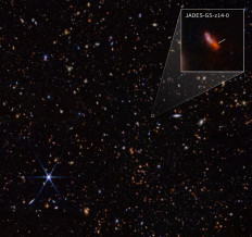 This handout image obtained on May 30, 2024 courtesy of NASA/ESA/CSA STScI shows an infrared image from James Webb Space Telescope (also called Webb or JWST) taken by the NIRCam (Near-Infrared Camera) for the JWST Advanced Deep Extragalactic Survey, or JADES, program. 