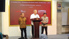 Public Works and Housing Minister Basuki Hadimuljono (center) speaks at a press briefing on June 3, 2024, as State Secretary Pratikno and  Agrarian and Spatial Planning Deputy Minister Raja Juli Antoni look on.