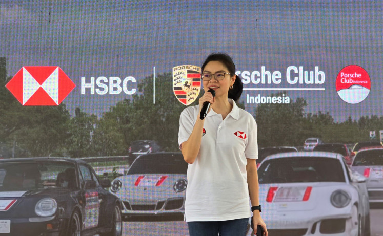 Fransisca Kallista Arnan, head of proposition, wealth and personal banking at HSBC Indonesia, delivers a speech at a community gathering involving HSBC Indonesia, Porsche Club Indonesia and Leica Indonesia.