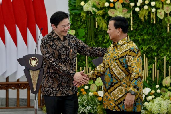 Neighborly meeting: Indonesian defense minister and president-elect Prabowo Subianto (right) and Singapore’s next leader Lawrence Wong shake hands after their meeting at the Bogor Presidential Palace in Bogor, West Java, on April 29, 2024.