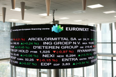 The Euronext's stock price indicator is displayed at the Euronext building in La Defense on the outskirts of Paris on May 10, 2024.