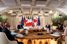 Italy's Prime Minister Giorgia Meloni, US President Joe Biden, French President Emmanuel Macron, Canada's Prime Minister Justin Trudeau, German Chancellor Olaf Scholz, Britain's Prime Minister Rishi Sunak, Japan's Prime Minister Fumio Kishida attend a session on Africa, climate change and development on the first day of the G7 summit at the Borgo Egnazia resort, in Savelletri, Italy, June 13, 2024. 