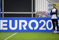 Germany's coach Julian Nagelsmann watches his players during a training session at the team's training camp in Herzogenaurach on June 11, 2024, ahead of the UEFA EURO 2024 football competition. 