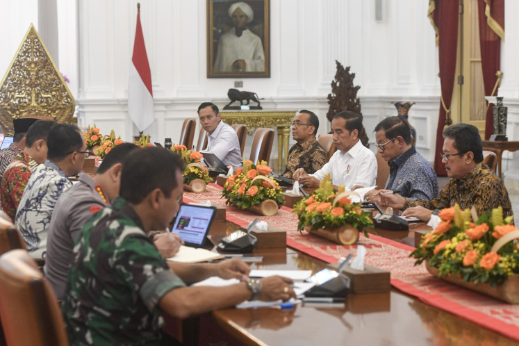 President Joko “Jokowi“ Widodo (third right) leads a limited cabinet meeting at Merdeka Palace in Jakarta on May 3, 2024 to discuss the eruption of Mount Ruang in North Sulawesi’s Sangihe Islands.
