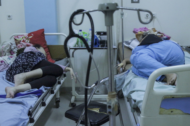 Food poisoning patients undergo treatment at Sekarwangi Regonal General Hospital in Sukabumi regency, West Java on June 5, 2024. At least 117 people suffered from food poisoning after dining at a party in the regency on June 2, according to the Sekarwangi health community center (puskesmas).