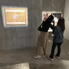 Spellbound: Visitors take pictures of the reliefs’ inception during an exhibition at Salihara arts center in South Jakarta on May 11, 2024. The exhibition presented reliefs commissioned by Indonesia’s first president Soekarno.