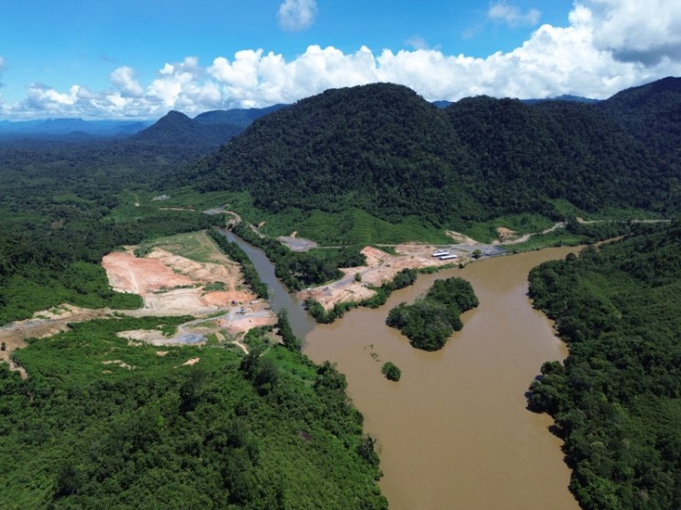 An aerial view of Tugu Lima (the five pillars area), the construction hub for the Kayan River Hydroelectric Power Plant project, in Peso district in Bulungan regency, North Kalimantan, June 5, 2024.