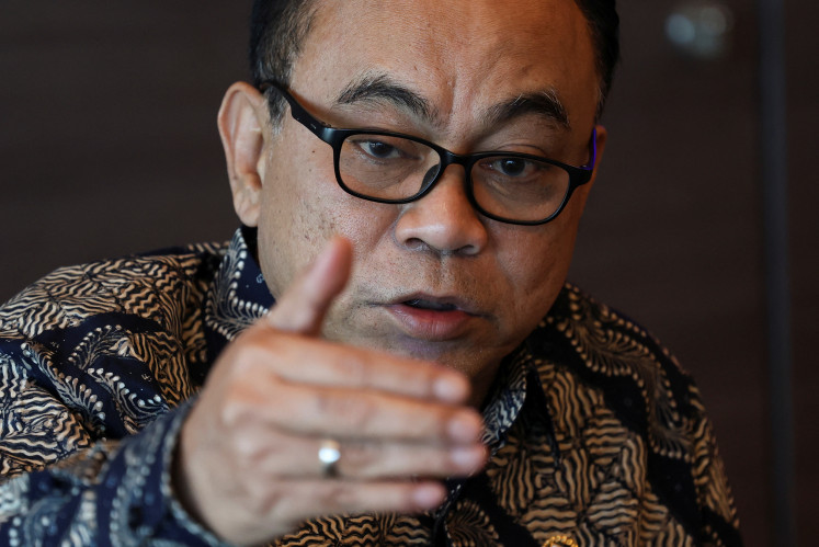 Communications and Information Minister Budi Arie Setiadi gestures during an interview at his office in Jakarta on June 14, 2024.