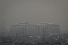 Thick haze obscures Jakarta International Stadium (JIS) in North Jakarta on June 15, 2024.