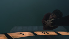 Hanging onto dear life: Fachri Albar’s character dangles from a clock tower’s minute hand in an episode of Joko Anwar’s Nightmares and Daydreams. (Courtesy of Netflix)