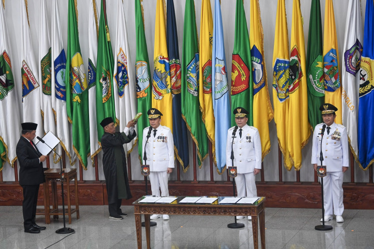 Home Minister Tito Karnavian (left) inaugurates three interim governors in a ceremony at the ministry's office in Jakarta on June 24, 2024: Agus Fatoni (third right) for North Sumatra, Elen Setiadi (second right) for South Sumatra and Maj. Gen. (ret) Hassanudin for West Nusa Tenggara (NTB).