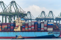 Global shipping: A container vessel is seen docked at West Coast port terminal in Singapore on April 17, 2024.