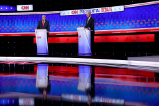 US President Joe Biden (right) and Republican presidential candidate, former US President Donald Trump participate in the CNN Presidential Debate at the CNN Studios on June 27, 2024 in Atlanta, Georgia.