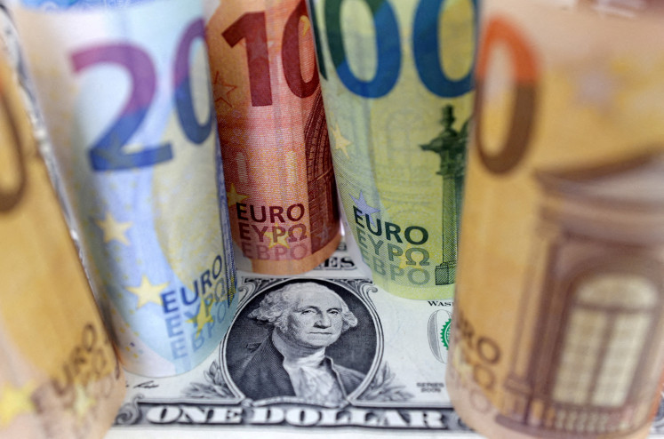 US dollar and euro banknotes are seen in this illustration photo taken July 17, 2022.