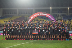 Indonesian soccer players pose at the podium during the third place award ceremony of the 2024 ASEAN U-16 Boys Championship at Manahan Stadium in Surakarta, Central Java, on July 3, 2024. Indonesia won third place in the competition after beating Vietnam 5-0 in the third place play-off.