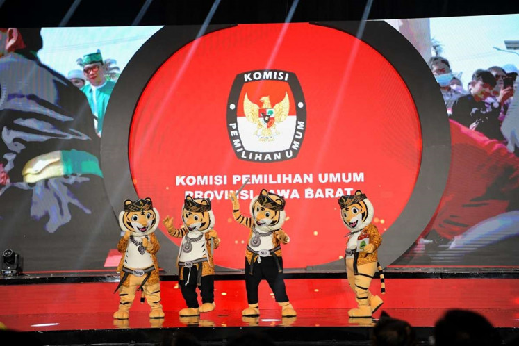 The mascots of West Java gubernatorial election pose on stage during the promotional launch of the election in Bandung, West Java on May 27, 2024.
