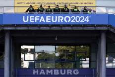 German police officers stand in the stadium after France's MD-1 training session at the Volksparkstadion in Hamburg on July 4, 2024 ahead of their UEFA Euro 2024 football match against Portugal. 