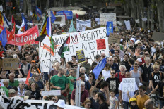 Barcelona residents protest against mass tourism