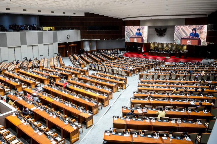 Lawmakers attend a House of Representatives plenary session on July 9, 2024 at the Senayan legislative complex in Jakarta.