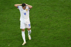 France's forward #10 Kylian Mbappe reacts to a missed chance during the UEFA Euro 2024 semi-final football match between Spain and France at the Munich Football Arena in Munich on July 9, 2024. 