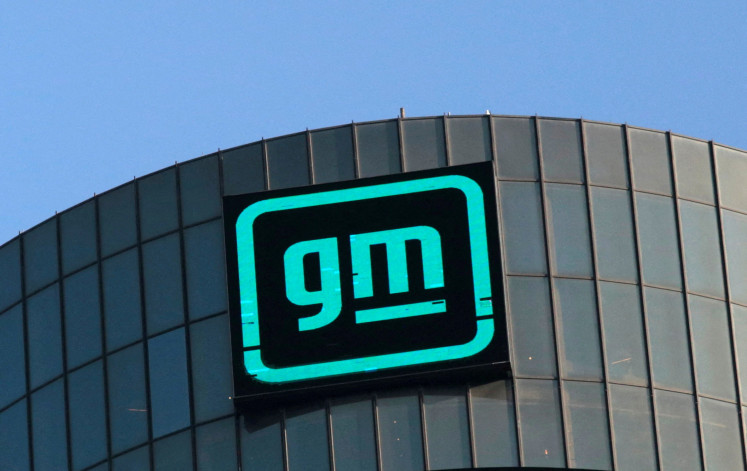 The GM logo is seen on the facade of the General Motors headquarters in Detroit, Michigan, US, on March 16, 2021.