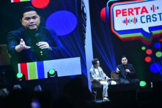 State-Owned Enterprises Minister Erick Thohir (far right) appears on July 9, 2024 as a featured guest on PertaCast during the AKHLAK Fest 2024, held at Istora Senayan of the Gelora Bung Karno Sports Complex in Jakarta.