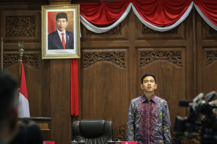 In this picture taken on October 19, 2023, former Surakarta mayor Gibran Rakabuming Raka, the son of then-president Joko “Jokowi“ Widodo, attends a public hearing with members of the regional council in Surakarta, Central Java. 
