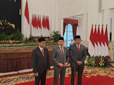 Deputy Investment Minister Yuliot Tanjung (left), Deputy Finance Minister Thomas Djiwandono (middle) and Deputy Agriculture Minister Sudaryono (right) give brief speeches following their inauguration at the Presidential Palace on July 18, 2024.