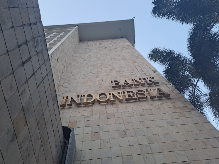 Metallic plating that reads 'Bank Indonesia' is seen on July 17, 2024, on one of the buildings of the central bank's headquarters complex.