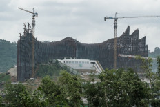 The Presidential Palace to-be in Nusantara, North Penajam Paser regency, East Kalimantan, undergoes construction work on July 11, 2024. 