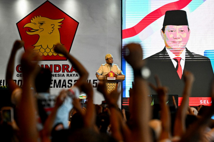 Defense Minister and presidential candidate Prabowo Subianto delivers a speech as he attends the Gerindra Party anniversary in Denpasar, Bali on Feb. 6, 2024, ahead of the presidential and legislative election on Feb. 14. 