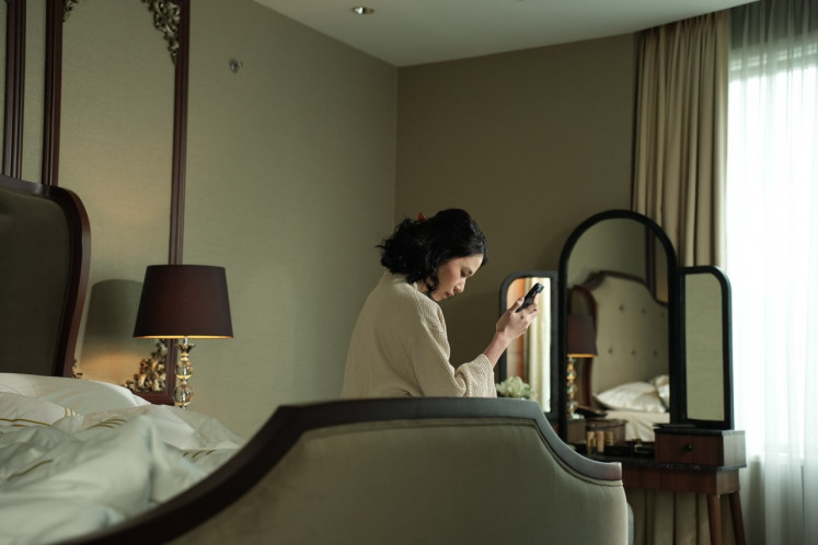 Reflecting humanity: Laura Basuki portrays Ava Alessandra, an acclaimed actress dealing with a dark past and emotionally wrought relationships, in a scene from ‘Heartbreak Motel' by director-writer Angga Dwimas Sasongko.