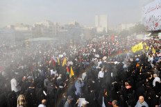 Iranians attend the funeral procession of assassinated Hamas chief Ismail Haniyeh in Tehran on Aug. 1, 2024. 