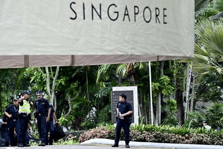 Policemen are seen at the Shangri-La Hotel during the 21st Shangri-La Dialogue summit on May 31, 2024, in Singapore. 
