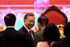 Vietnam's Communist Party names To Lam top leader