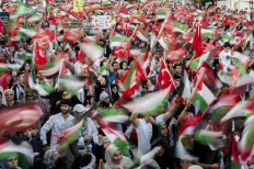 Pro-Palestinian demonstrators wave the flags of Turkey and Palestine during a rally to condemn the assassination of Hamas leader Ismail Haniyeh, at Hagia Sophia Square in Istanbul, on August 3, 2024. 