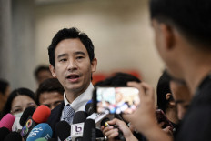 Former Thai prime ministerial candidate and former leader of the progressive Move Forward Party (MFP) Pita Limjaroenrat speaks to the media at the Thai Parliament before the Constitutional Court decides on whether to dissolve his party over its pledge to reform the royal insult laws, in Bangkok on August 7, 2024.