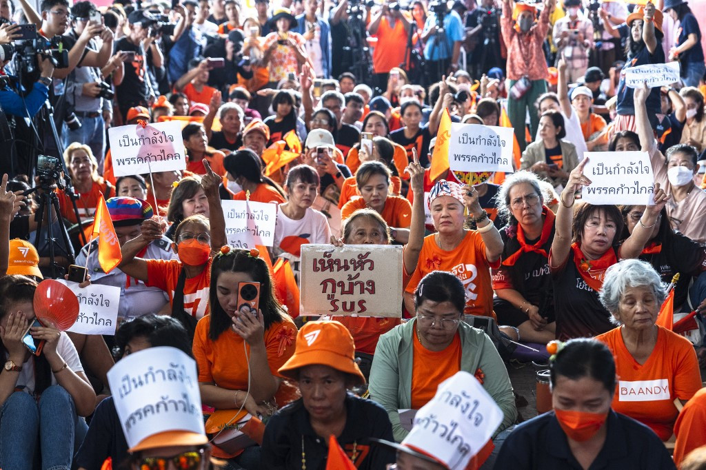Supporters at the Move Forward Party (MFP) headquarters react after Thailand's Constitutional Court ruled that former MFP leader Pita Limjaroenrat was to receive a decade-long ban and dissolve his party after challenging royal defamation laws, in Bangkok on Aug. 7, 2024. The Constitutional Court in Bangkok voted on August 7 “unanimously“ to dissolve the Move Forward Party and ban its executive board, which includes its former leader Pita Limjaroenrat, for 10 years, judge Punya Udchachon said.