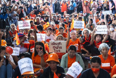 Supporters at the Move Forward Party (MFP) headquarters react after Thailand's Constitutional Court ruled that former MFP leader Pita Limjaroenrat was to receive a decade-long ban and dissolve his party after challenging royal defamation laws, in Bangkok on Aug. 7, 2024. The Constitutional Court in Bangkok voted on August 7 “unanimously“ to dissolve the Move Forward Party and ban its executive board, which includes its former leader Pita Limjaroenrat, for 10 years, judge Punya Udchachon said.