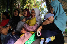 Mothers face challenges amid strong determination to breastfeed