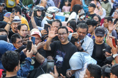 Supporters rally to urge PDI-P, PKS backing for Anies