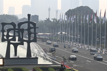 Vehicles carrying state officials and other guests of the State of the Nation address on Aug. 16, 2024 arrive at the Senayan Legislative Complex in South Jakarta.