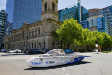 The Tokai Challenger solar car from Japan drives down the road upon arrival in Adelaide, Australia, to finish in second place in the 2019 World Solar Challenge from Darwin to Adelaide on October 17, 2019.