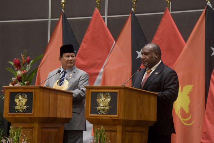 Papua New Guinea Prime Minister James Marape (right) speaks at a joint press conference with Defence Minister and president-elect Prabowo Subianto in Port Moresby on Aug. 21, 2024. 