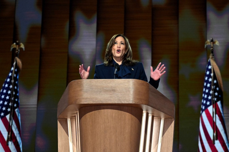 US Vice President and 2024 Democratic presidential candidate Kamala Harris speaks on the fourth and last day of the Democratic National Convention (DNC) at the United Center in Chicago, Illinois, on August 22, 2024. 