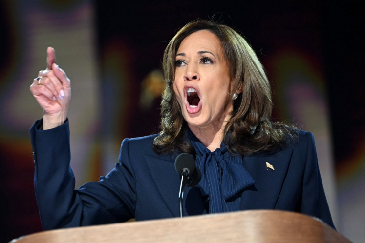 US Vice President and 2024 Democratic presidential candidate Kamala Harris speaks on the fourth and last day of the Democratic National Convention (DNC) at the United Center in Chicago, Illinois, on August 22, 2024. 