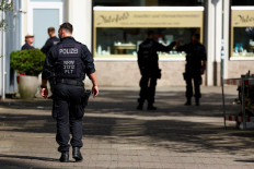 German police hunt for assailant in festival stabbing that killed three