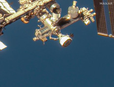 This handout image courtesy of Maxar Technologies taken on June 7, 2024 shows the Boeing Starliner spacecraft docked with the International Space Station's (ISS) forward port on the station's Harmony module. 