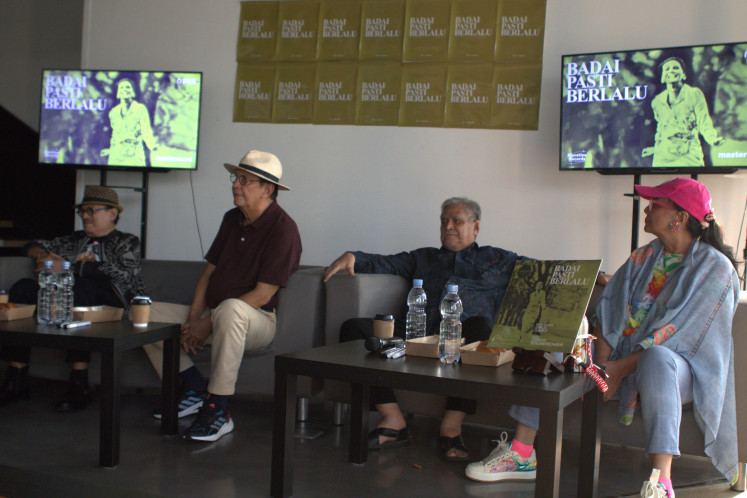 Tracing history: Eros Djarot (left), Roy Marten (second left), Slamet Rahardjo (second right) and Christine Hakim sit down for a talk about the 1977 film “Badai Pasti Berlalu“ and its acclaimed soundtrack during the release of the album's vinyl reissue on Sunday at Sonaa Space in Senayan Park, Central Jakarta.